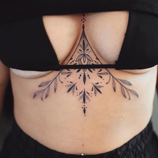 Small Mandala Floral on Women Sternum Tattoo by @joanie.psychedelia