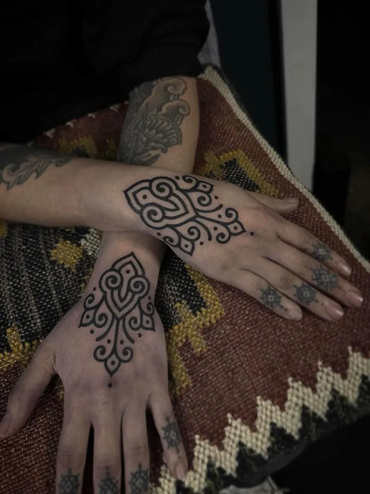 Small Mandala Heart on Women Hands Tattoo by @neina.neina