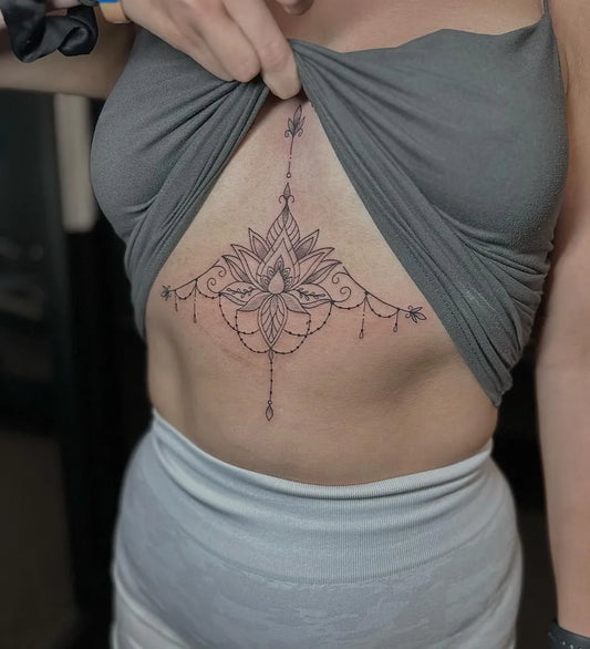 Small Mandala Lotus Mandala on Women Sternum Tattoo by @phantominktattooshop