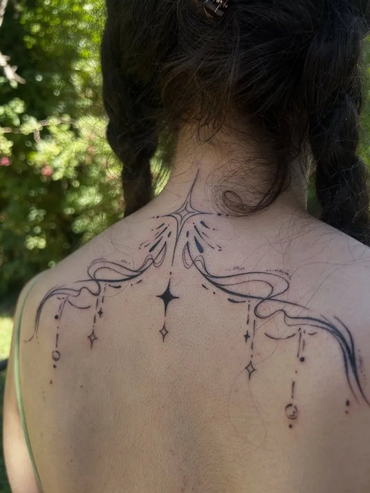 Small Mandala Star on Women Back Tattoo by @enii_tattoo