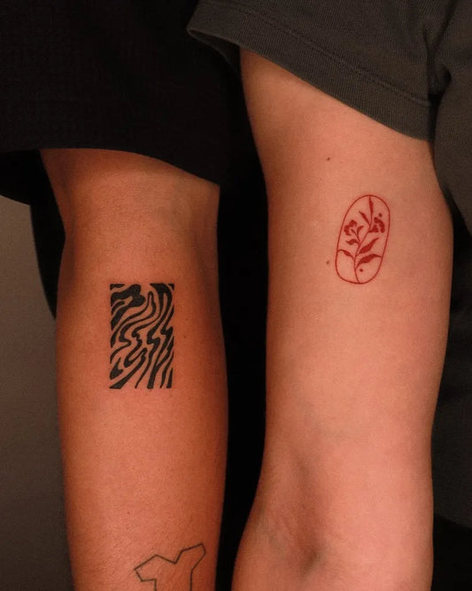 Small Matching Blackwork ZebraStripes Tattoo on Women Forearm by @wabisabi_ttt