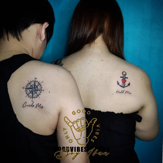 Small Matching Compass and Anchor Tattoo on Women Shoulder by @boy_iban