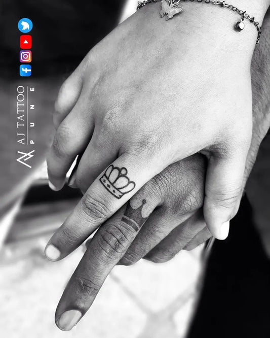 Small Matching Crown Tattoo on Couple Finger by @ajtattoopune