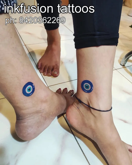 Small Matching Evil Eye on Women Ankles Tattoo by @louisanthony84259