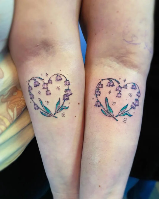 Small Matching Fine Line Lily of the Valley Heart Women Arm Tattoo by @daniellaturanoart