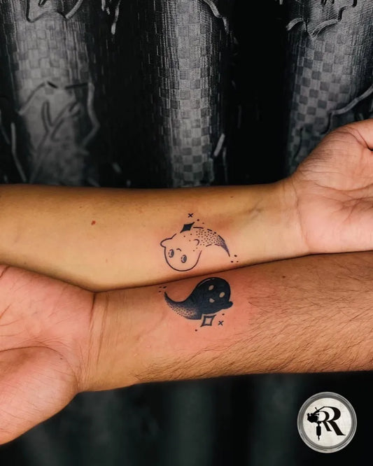 Small Matching Yin Yang Ghost Tattoo on Women Wrist by @redrose___tattoostudio