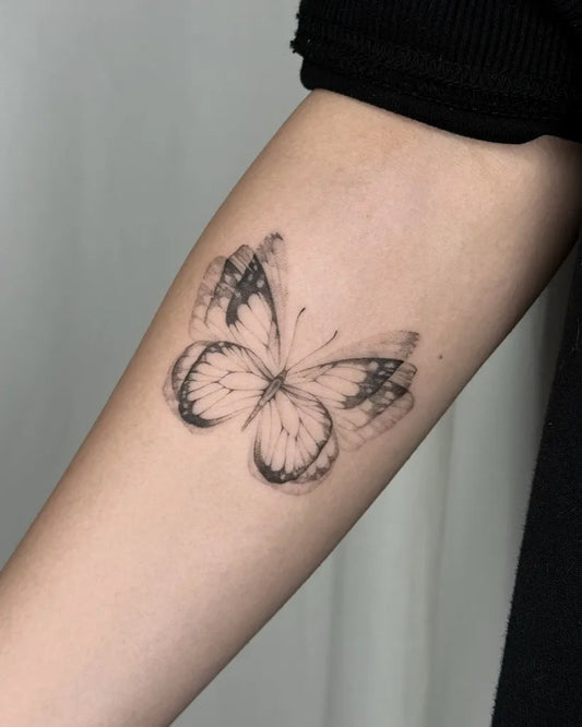 Small Micro Realism Abstract Butterfly on Women Arm Tattoo by @vicky.inks