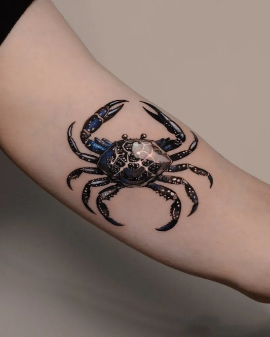 Small Micro Realism Black Crab on Women Arm Tattoo by @wojtekrydlewski