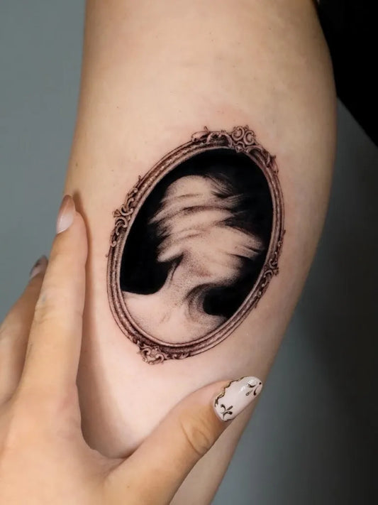 Small Micro Realism Cameo Portrait on Women Arm Tattoo by @marily_tattoo