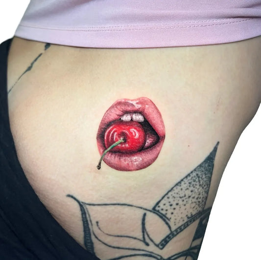 Small Micro Realism Cherry Lips on Women Hip Tattoo by @taliainks