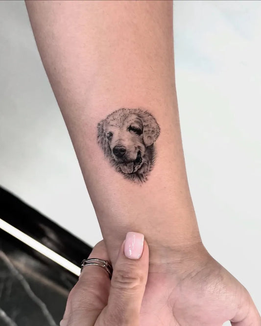 Small Micro Realism Labrador Face on Women Wrist Tattoo by @afanasieva_tattoo_