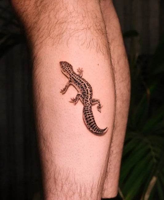 Small Micro Realism Leopard Gecko on Men Leg Tattoo by @nastiya_k11