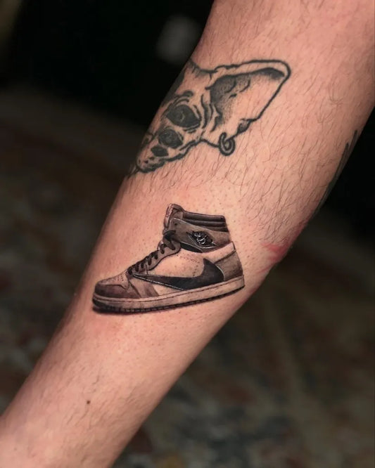 Small Micro Realism Sneaker and Skull on Men Arm Tattoo by @mina.tattooinked