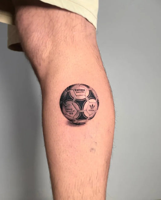 Small Micro Realism Soccer Ball on Men Leg Tattoo by @vigilia_tattoo