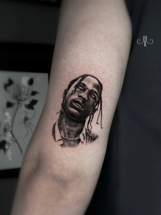 Small Micro Realism Travis Scott Portrait on Women Arm Tattoo by @mirianasart
