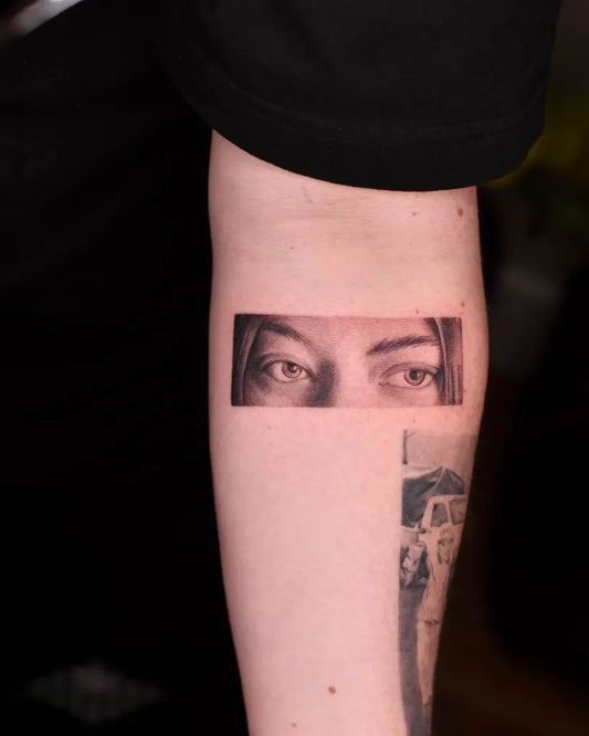 Small Micro Realism Woman Eyes on Men Arm Tattoo by @bryan.gee