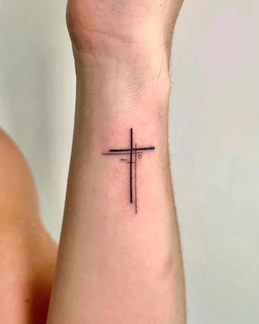 Small Minimalist 3 Cross Tattoo on Men Wrist by @inkdistrict.ph