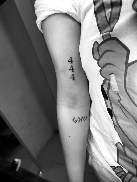 Small Minimalist 444 and Greek symbol on Women Arm Tattoo by @iceinkcpt