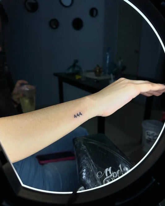 Small Minimalist 444 on Women Wrist Tattoo by @studio15_tattoos