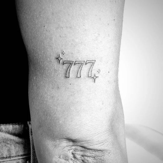 Small Minimalist 777 Stars Tattoo on Women Thigh by @tattthisway
