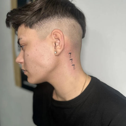 Small Minimalist 777 Tattoo on Women Neck by @irenefinetattoos