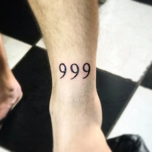 Small Minimalist 999 Tattoo on Men Ankle by @dark_arts_tattoo