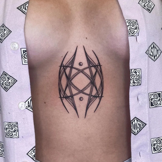 Small Minimalist Abstract Geometric Symbol on Men Sternum Tattoo by @lower.caps