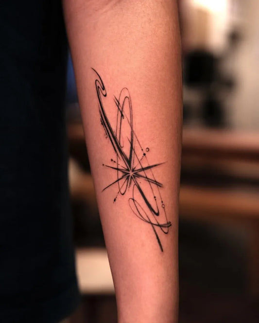 Small Minimalist Abstract Star on Men Forearm Tattoo by @eul.ink