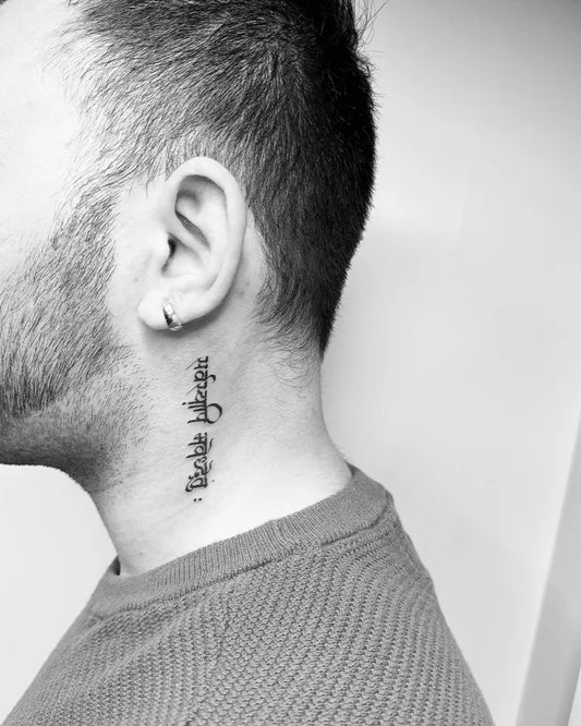 Small Minimalist Arabic Script on Men Neck Tattoo by @jenxi.tattoo
