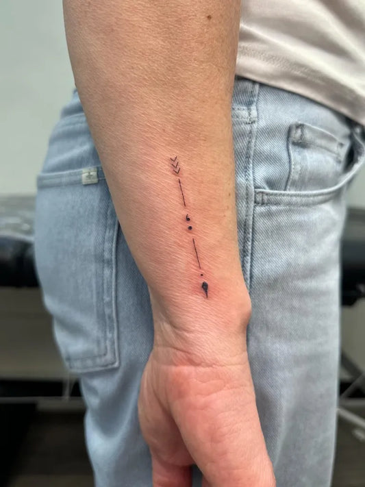 Small Minimalist Arrow Semicolon on Women Forearm Tattoo by @inked_by_steph