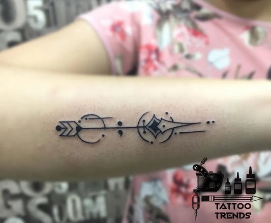 Small Minimalist Arrow Symbol Tattoo on Women Forearm by @tattootrendsbangalore