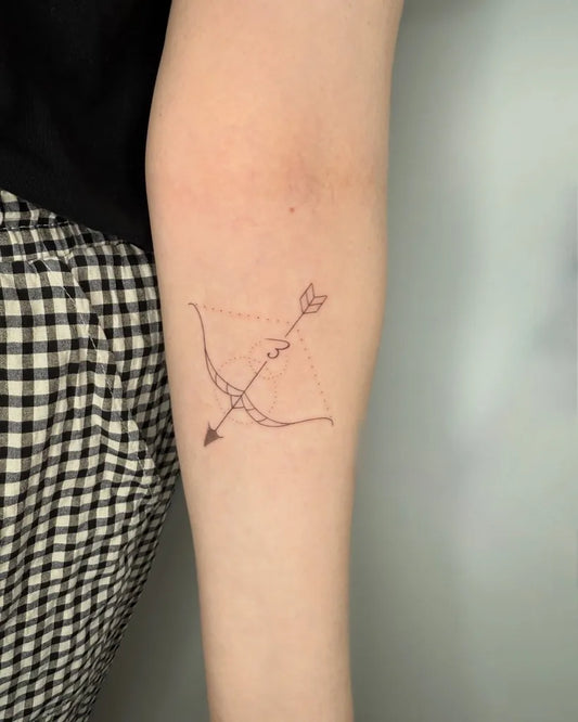 Small Minimalist Arrow Tattoo on Women Arm by @francielitattooart