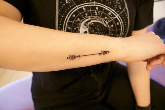 Small Minimalist Arrow Tattoo on Women Forearm by @mama_to_oli