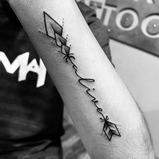 Small Minimalist Arrow Word Tattoo on Men Arm by @riseinktattoo_and_nailart
