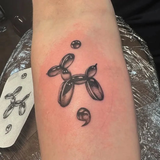 Small Minimalist Balloon Dog Semicolon on Women Arm Tattoo by @lucky_13rva