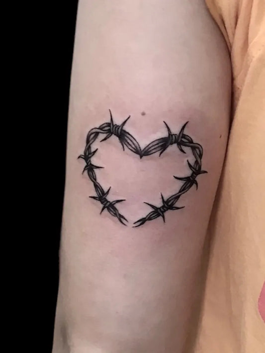 Small Minimalist Barbed Wire Heart on Women Arm Tattoo by @kuroro_17