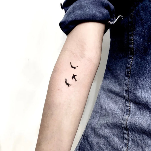 Small Minimalist Birds Tattoo on Women Arm by @tirta_arutalatattoo