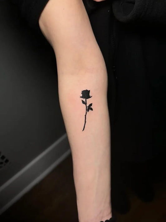 Small Minimalist Black Rose on Women Arm Tattoo by @chrollo_ink