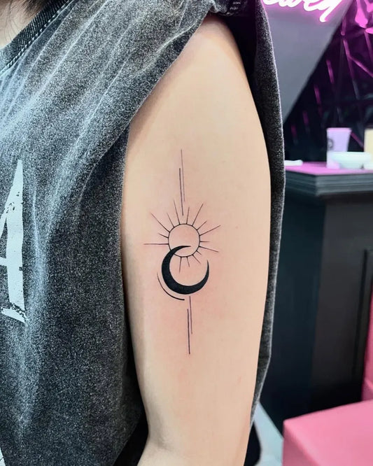 Small Minimalist Blackwork Sun and Moon on Women Arm Tattoo by @rabbitink_ndrumz