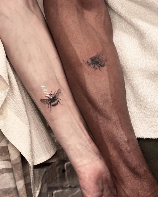 Small Minimalist Bumblebee on Couple Forearm Matching Tattoo by @disantostattoo