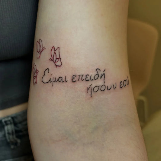 Small Minimalist Butterflies and Greek Text on Women Upper Arm Tattoo by @shanicejohn.nails