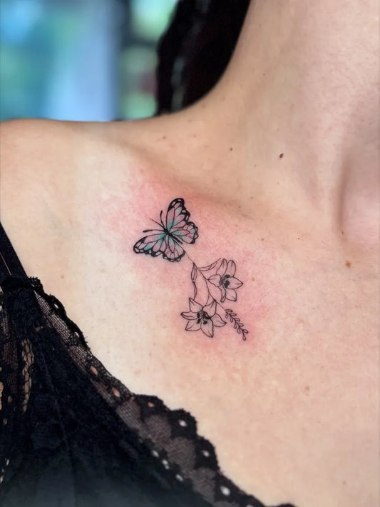 Small Minimalist Butterfly and Flowers on Women Shoulder Tattoo by @belinda_tattoos1
