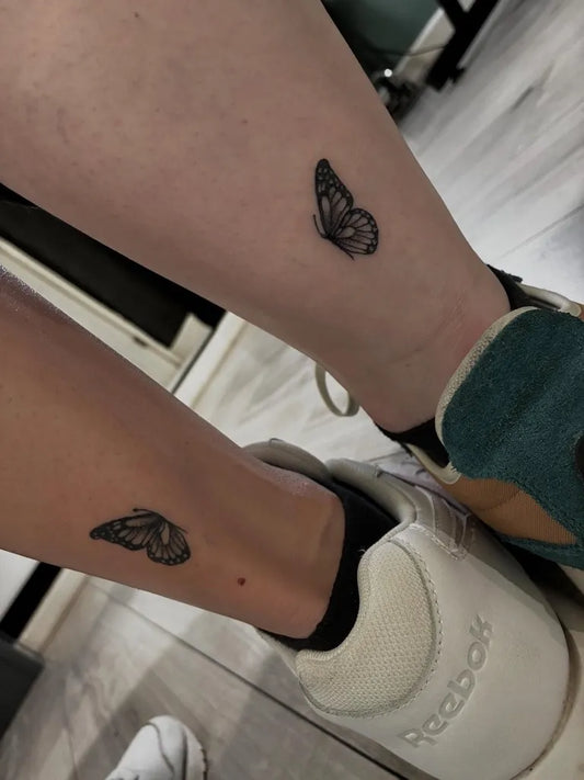 Small Minimalist Butterfly on Women Ankle Tattoo by @inked_port_tattoo