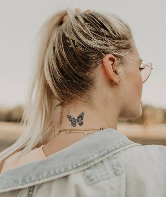 Small Minimalist Butterfly on Women Nape Tattoo by @fashioneveryday
