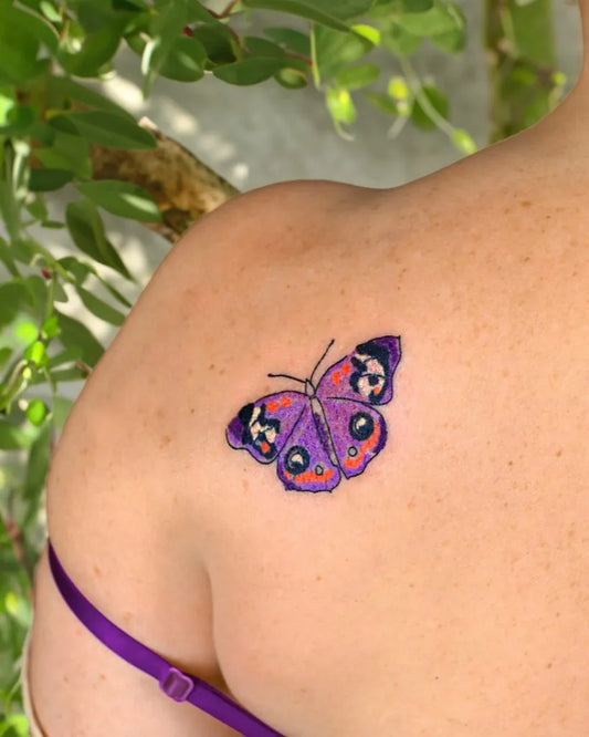 Small Minimalist Butterfly on Women Shoulder Tattoo by @tattoo.joojoo