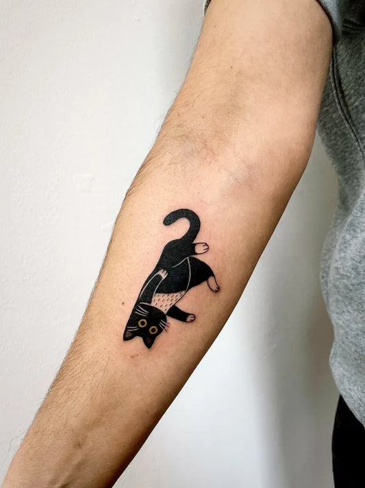 Small Minimalist Cat Tattoo on Men Arm by @leuketatjes