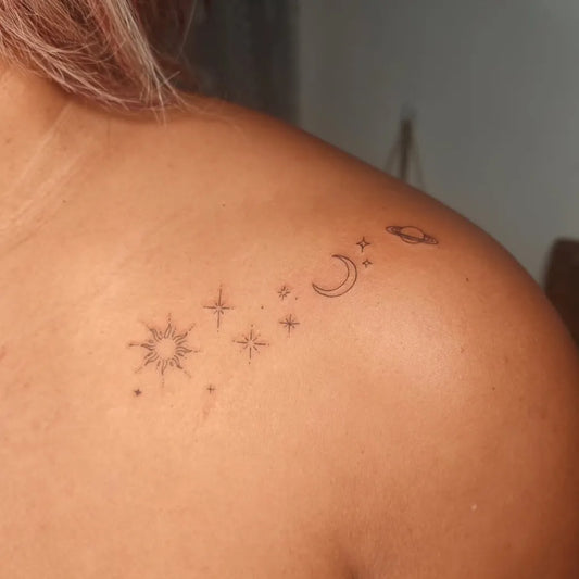 Small Minimalist Celestial Bodies Tattoo on Women Shoulder by @sacredtree_ink