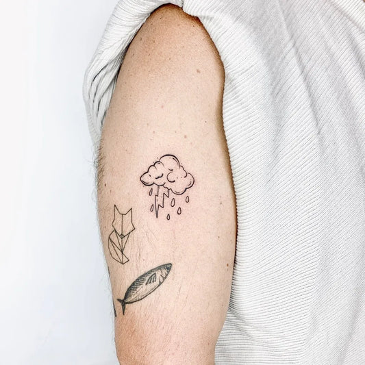 Small Minimalist Cloud Rain Fox Tattoo on Men Arm by @nasarastudio