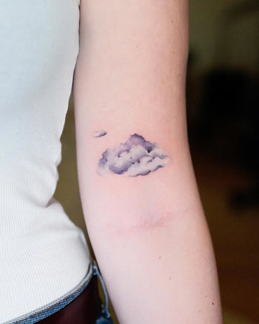 Small Minimalist Cloud Tattoo on Women Arm by @veroni.ink
