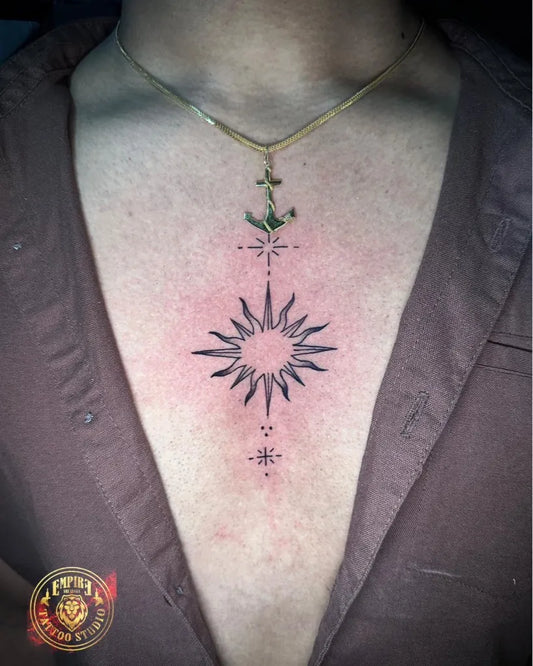 Small Minimalist Compass Rose with Anchor and Stars on Women Chest Tattoo by @empiretattoostudiosl